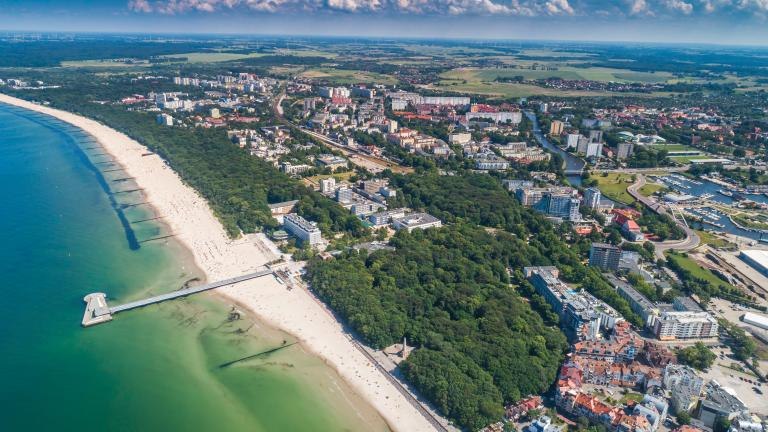 shutterstock_1497500966 Aerial view of Kolobrzeg - a beautiful city and spa on the Baltic Sea.jpg